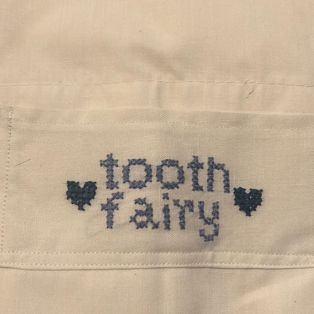 Tooth fairy pillow case embroidered with pint stitch and pocket for tooth